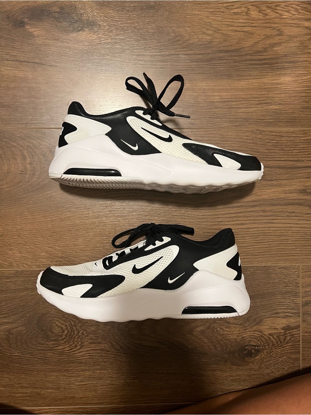 Women’s Nike Air Max Bolt sneakers in a white and black